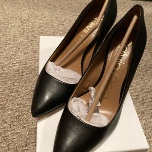 Black Calvin Klein faux leather pumps size 8